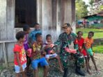 Mengenal Lebih Dekat: Interaksi Satgas Pamtas RI-PNG dan Generasi Muda di Kampung Usku Interaksi Satgas Pamtas dan Generasi Muda, Kampung Usku Perbatasan RI-PNG, Mempererat Hubungan Sosial, Anak-anak Papua, Aktivitas Satgas Yonif 310/KK